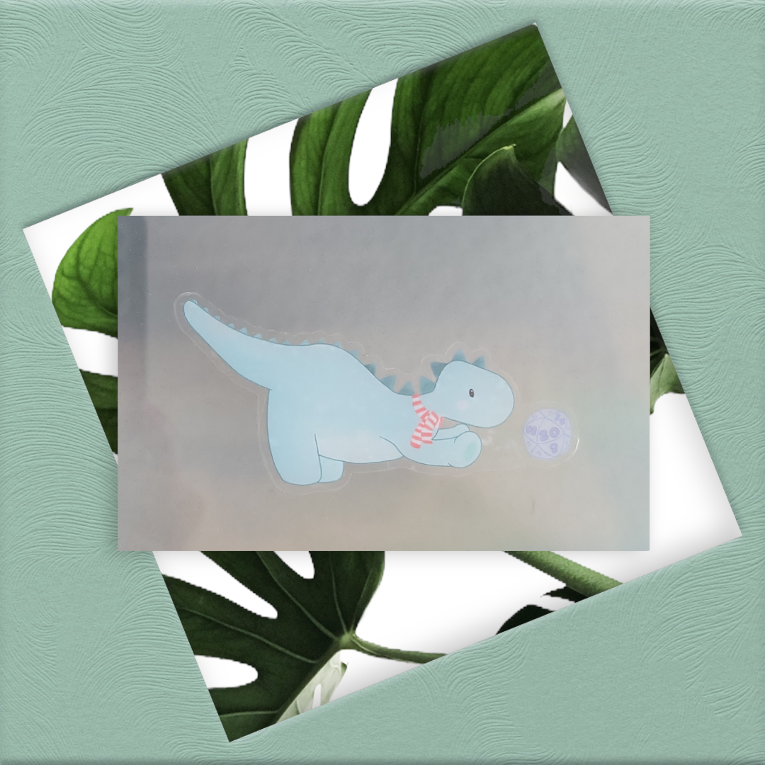 Dinosaur playing with a D20 Sticker